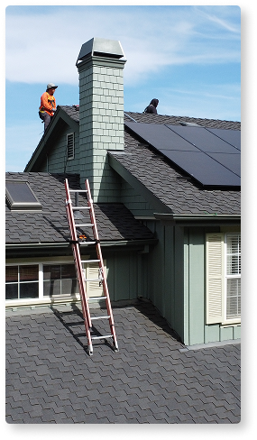 people installing solar panels