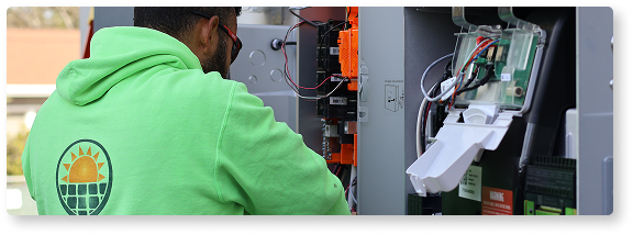 person installing back up battery